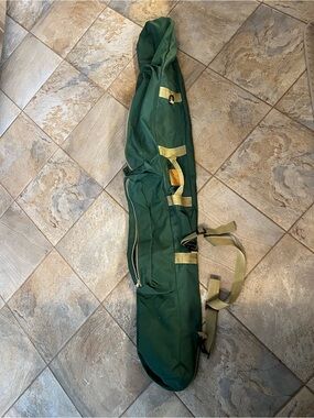 Vintage Cabelas Rod Bag
Green Nylon Bag Adjustable Straps 2 outside pockets